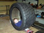 well-see-your-expensive-crib-and-raise-you-an-old-tire.jpg