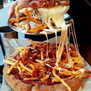 when you order cheese fries at this place it comes with a whole pizza