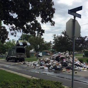 either the garbage truck exploded or someone just took out the trash for a hoarder