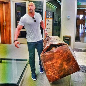 the rock is going make sure his carryon fits in the overhead bin