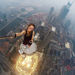 this selfie on top of a tall building thing is great but i m sticking to the couch thanks