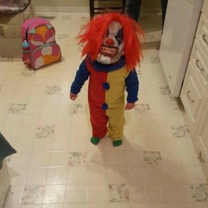 evil baby clown just wants his bottle of blood