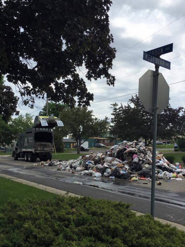 either the garbage truck exploded or someone just took out the trash for a hoarder