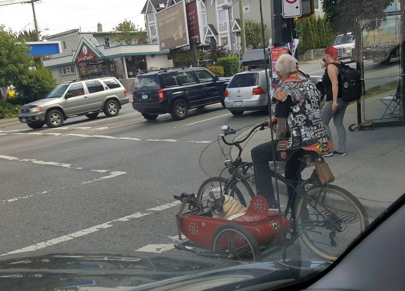 the guy on the bike is nice but his dog is a real nazi