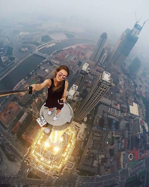 this selfie on top of a tall building thing is great but i m sticking to the couch thanks